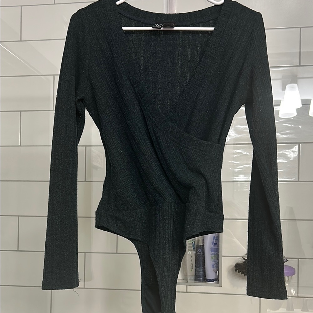 Elegant dark green bodysuit
